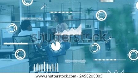 Image of graphs, loading bars and circles over diverse coworkers sharing ideas on desk. Digital composite, multiple exposure, report, business, progress, planning, teamwork and discussion concept.