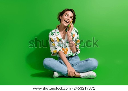 Full body size image of attractive young woman influencer call phone her partner looking empty space isolated on green color background