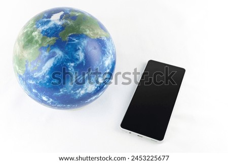 Smartphone and globe. Image of map app