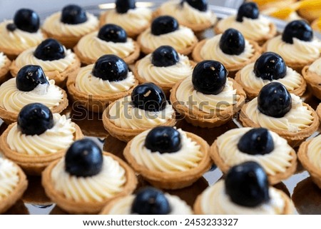 coffee break hotel during conference meeting, corporate revent with tea and coffee catering, decorated catering banquet table with variety of different pastry and bakery, with croissants and cookies Royalty-Free Stock Photo #2453233327