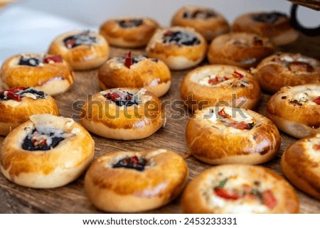 coffee break hotel during conference meeting, corporate revent with tea and coffee catering, decorated catering banquet table with variety of different pastry and bakery, with croissants and cookies Royalty-Free Stock Photo #2453233331