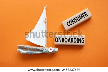 Consumer Onboarding symbol. Wooden blocks with words Consumer Onboarding. Beautiful orange background with boat. Business and Consumer Onboarding concept. Copy space.