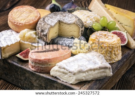 cheese plate Royalty-Free Stock Photo #245327572