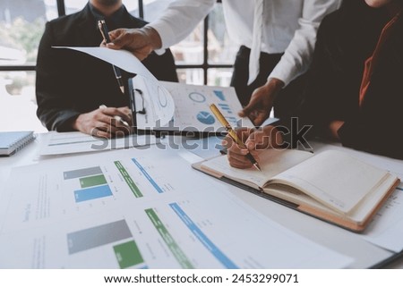 Asian business advisor meeting to analyze and discuss the situation on the financial report in the meeting room. brainstorming, discussing, and analyzing business strategy. Financial advisor concept