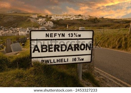 Aberdaron village road sign in evening sunlight. Aberdaron is on the coast of the Llyn Peninsula in Gwynedd.