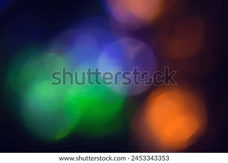 Defocused neon glow. Overlay of light highlights. Futuristic LED lighting. Blur of colored bokeh on dark abstract background