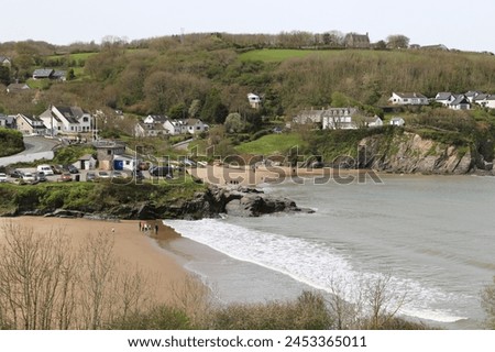 A view across the beautiful beach at Aberporth, Ceredigion, Wales, UK. Royalty-Free Stock Photo #2453365011