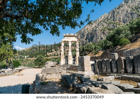 Delphi, Greece. Tholos of Athena Pronaia. Ruins of an ancient city. Summer day