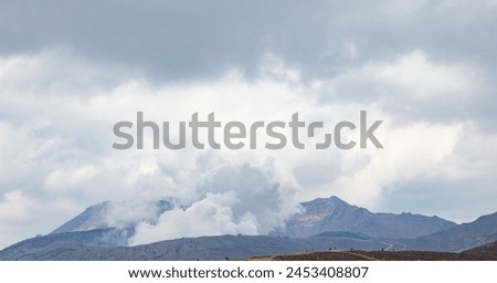 Mount Aso (Aso-san), the largest active volcano in Japan stands in Aso Kuju National Park, Aso (Aso-shi), Kyushu Region, Kumamoto Prefecture, Japan Royalty-Free Stock Photo #2453408807