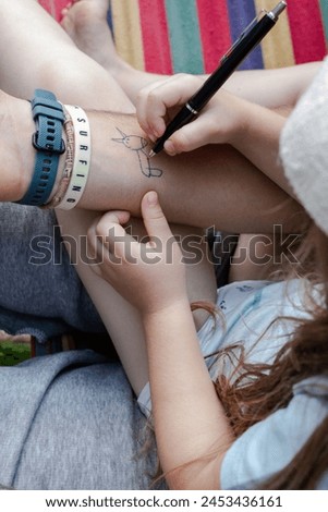 children's tattoo, drawing on the palm, family, creativity