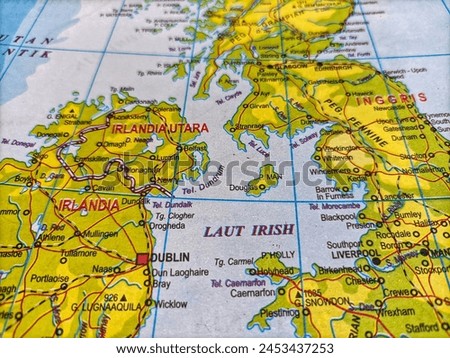 The Irish Sea on the map divides mainland England and mainland Ireland. Royalty-Free Stock Photo #2453437253