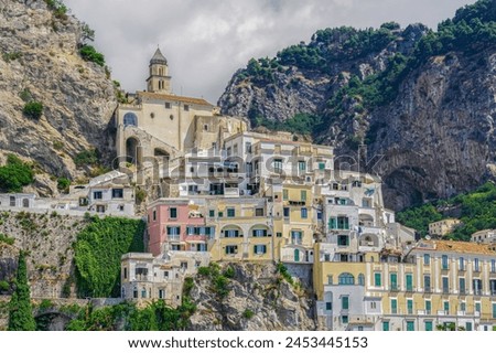 View of low-rise traditional buildings and cliffs along the coastline in Costiera Amalfitana (Amalfi Coast), UNESCO World Heritage Site, Campania, Italy, Europe Royalty-Free Stock Photo #2453445153