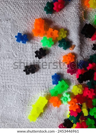 Colourful puzzle pieces set out on table