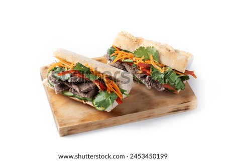 Vietnamese banh mi sandwich isolated on white background Royalty-Free Stock Photo #2453450199