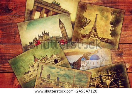 Photos from holidays, vacation lying on wooden table. Memories, travel, famous places. Retro vintage style