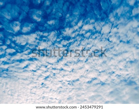 The view of the sky filled with clouds like white cotton Royalty-Free Stock Photo #2453479291