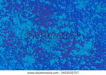 Blue abstract pattern plaster wall paint solid surface rough background texture stucco structure navy grunge.