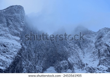Trollveggen mountains in winter (Norway). Royalty-Free Stock Photo #2453561905