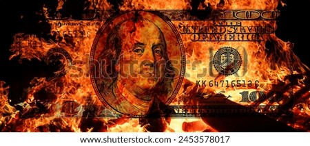 100  US dollar banknote in flame for design purpose