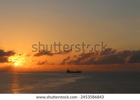 General purpose cargo ships are frequently seen off the coasts of south Florida. Royalty-Free Stock Photo #2453586843