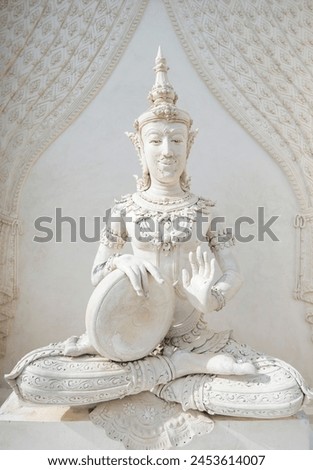 sculpture of a person buddha statue in temple
