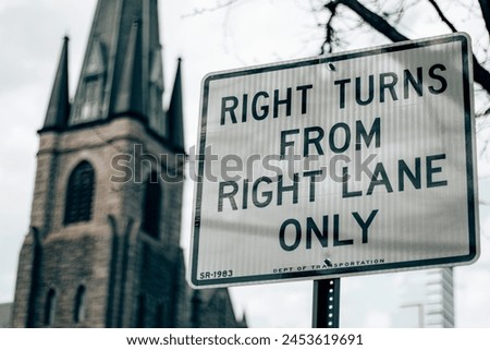 Right turns from right lane only sign on the side of the street in Manhattan - New York City.