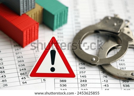 Global business container cargo ship in import export business logistic and attention road sign with handcuffs on calculations of tax report