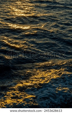 photo of sea water exposed to sunlight in the afternoon