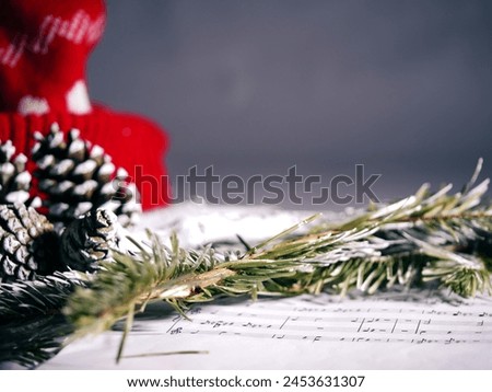 Christmas carol music sheet festive background medium shot selective focus