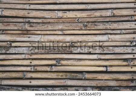 Empty old dry brown natural bamboo timber wall seamless background for product montage.Horizontal.