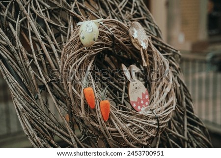 Handcrafted Easter Wreath with Festive Decorations Royalty-Free Stock Photo #2453700951