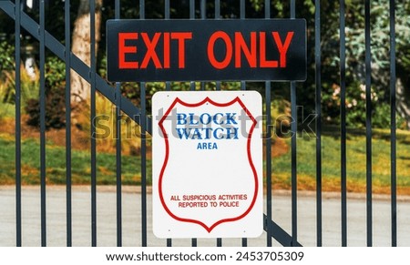 Private property warning sign in Vancouver. All suspicious activities report to police 
