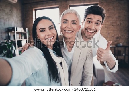 Portrait of group friendly corporate coworkers maker selfie show thumb up loft interior modern office indoors