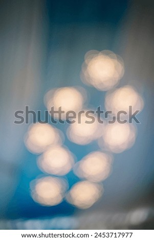 Intentionally blurred photo of decorative lights, adding ambiance and visual interest to designs, perfect for artistic and creative projects