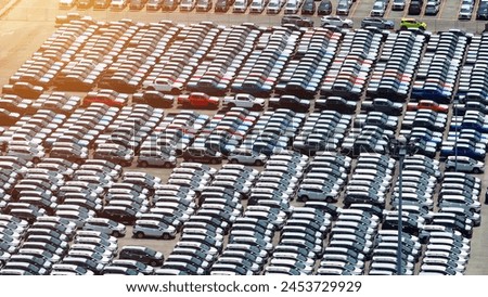 A symphony of automotive efficiency unfolds below, as cars dot the landscape in perfect harmony. This aerial vista encapsulates the systematic essence of the automotive domain.
