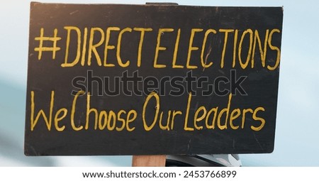 Banner, protest and government with politics, rally and poster for human rights, vote and sign. Elections, choice and board for opinion, freedom and equality in support of revolution and change