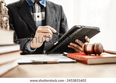 Online consulting in law leverages digital platforms for legal advice and guidance, ensuring access to justice while upholding principles of fairness, equality, accountability in legal proceedings. Royalty-Free Stock Photo #2453831603