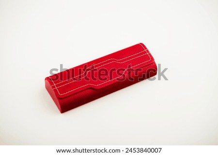 Case for glasses. Glasses in a leather storage case. Magnetic cover. lie horizontally. on an isolated white background. Close-up. space for text.