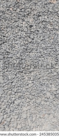 Texture of stretch of crushed gravel in the yard