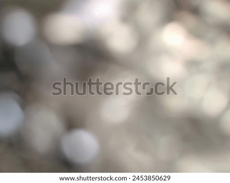 Abstract blurred silver bokeh background