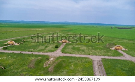 old abandoned millitary airport and plane - shiraki georgia top view