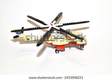 Helicopter, children's toy, side view of the model.
