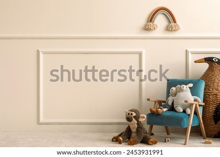 Creative composition of cozy children room interior with copy space, blue velvet armchair, animal plush toys, wicker basket, beige wall with stucco and personal accessories. Home decor. Template.
