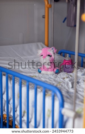children's bed in hospital with toys