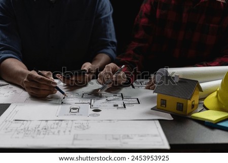 A team of engineers is helping design blueprints and collaborating on structural analysis of the housing and housing concept project types.