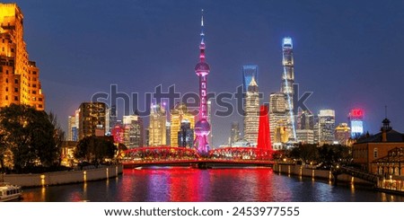 Shanghai skyline at Bund with Oriental Pearl Tower downtown panorama at twilight night in China