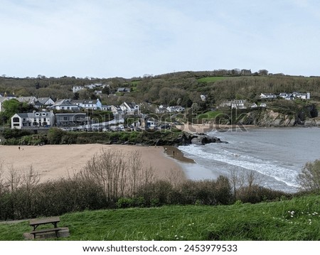 A view across the beautiful beach at Aberporth, Ceredigion, Wales, UK. Royalty-Free Stock Photo #2453979533