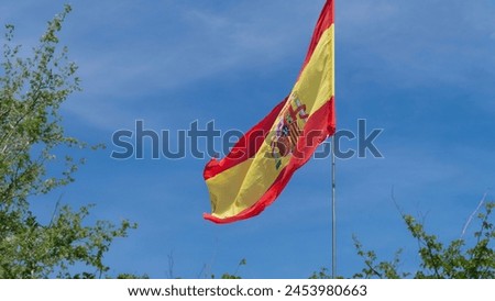 Spanish flag waving pictured in Madrid, Spain