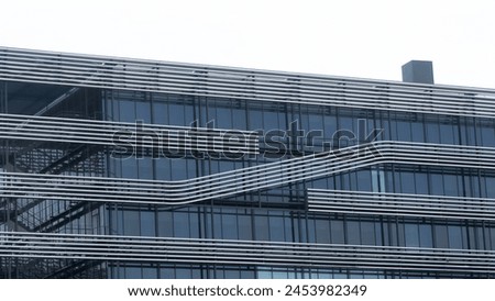 Striped and modern big building pictured in Madrid, Spain