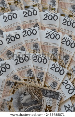 Polish 200 zloty banknotes arranged in a fan